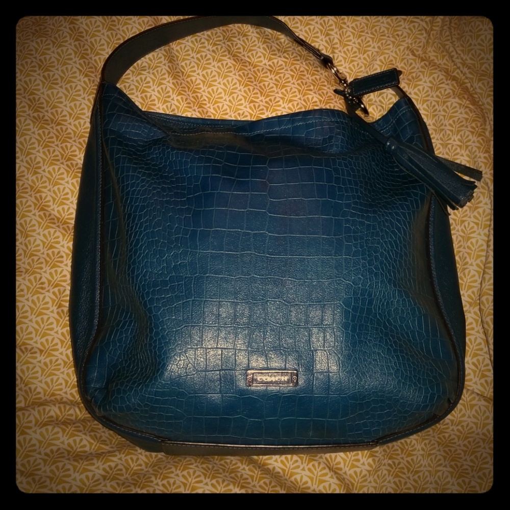 Blue embossed Coach Avery bag